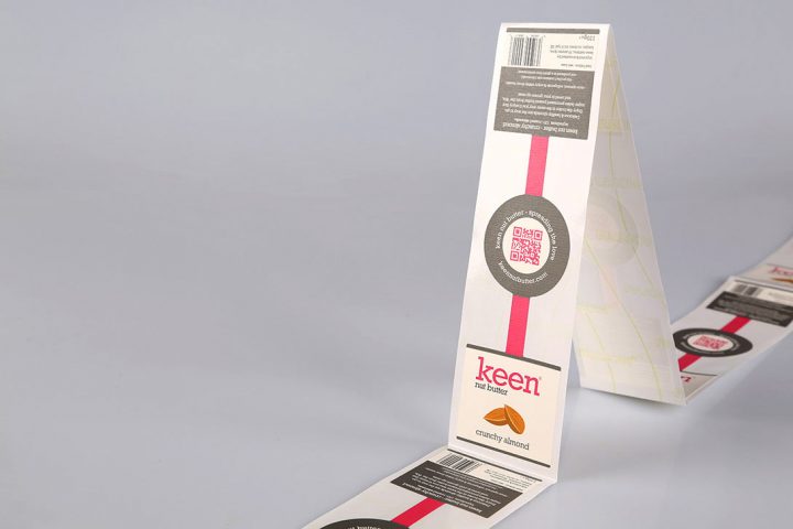 Custom-shaped packaging labels on rolls