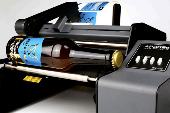 Beer Labels being applied on a Label Application Machine